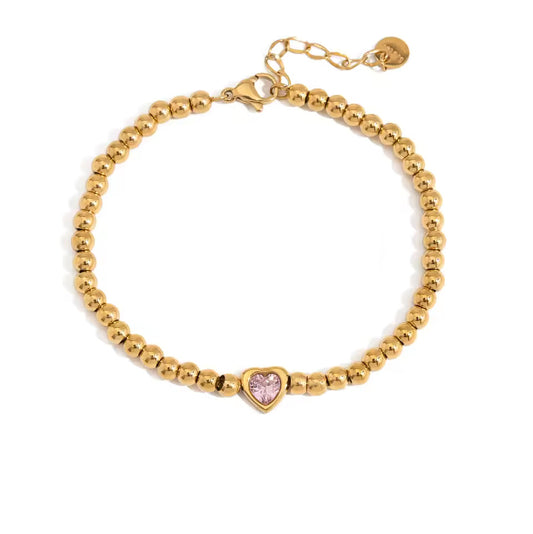 Bracelet Alma en acier inoxydable doré avec cœur rose