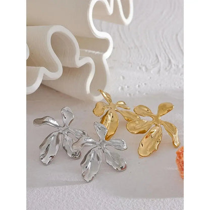 Boucles Fleuréa en acier inoxydable