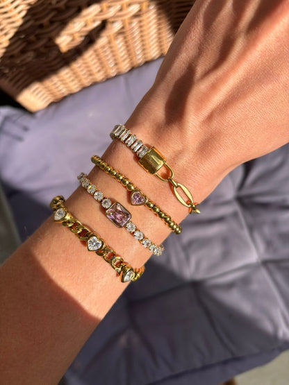 Bracelet Alma en acier inoxydable doré avec cœur rose
